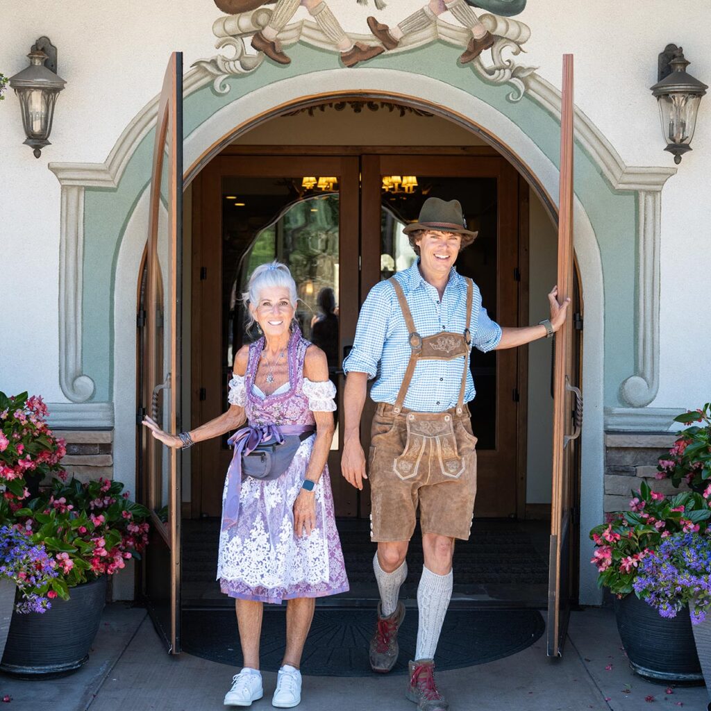 Our Walking Tour guides walking through a Bavarian doorway